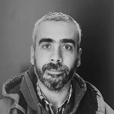 Black and white headshot of Cristián Petit-Laurent